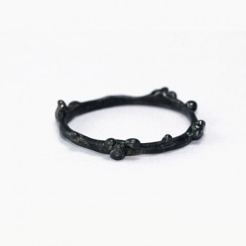 Magnificent oxidized silver ring of asymmetric form
